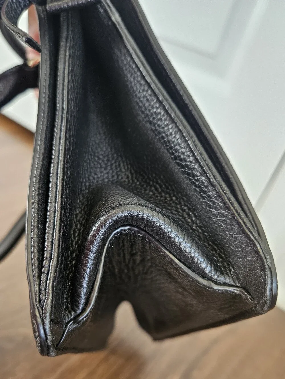 kate spade black pebbled leather satchel with gold accents